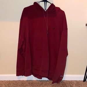 Maroon Champion hoodie.